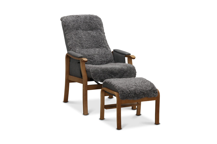 Bergen fåtölj med fotpall fårskinn ljusgrå