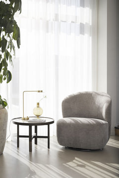 Roselawn fåtölj beige tyg snurr