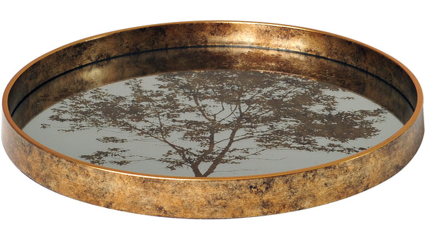 Golden serveringsbricka med trädmotiv