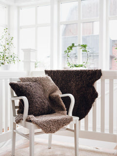 Curly fårskinn brun melange